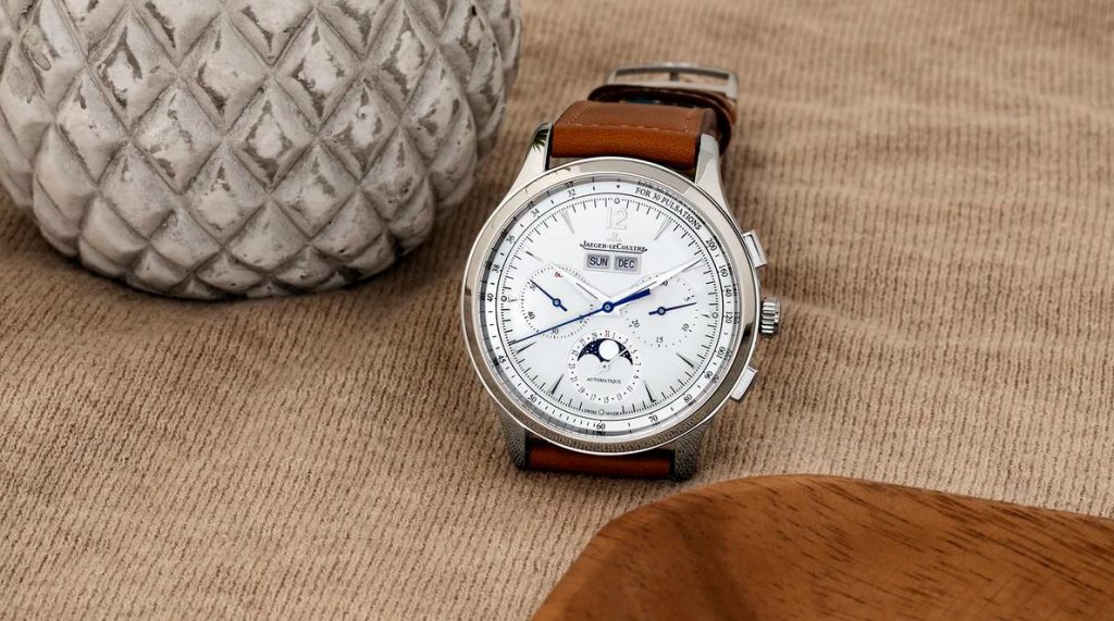 The white dial fake watch has moon phase.