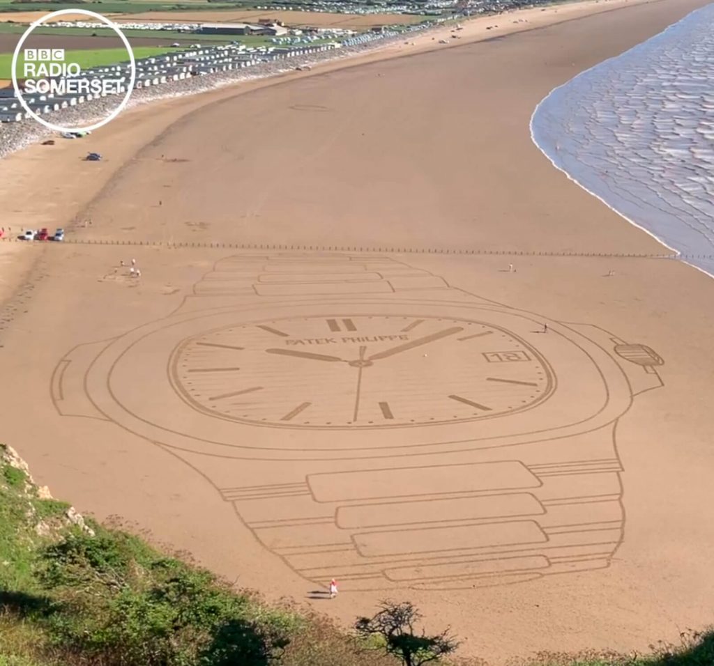 Giant Patek Philippe Nautilus drawing by Simon Beck on Brean beach in Somerset, England