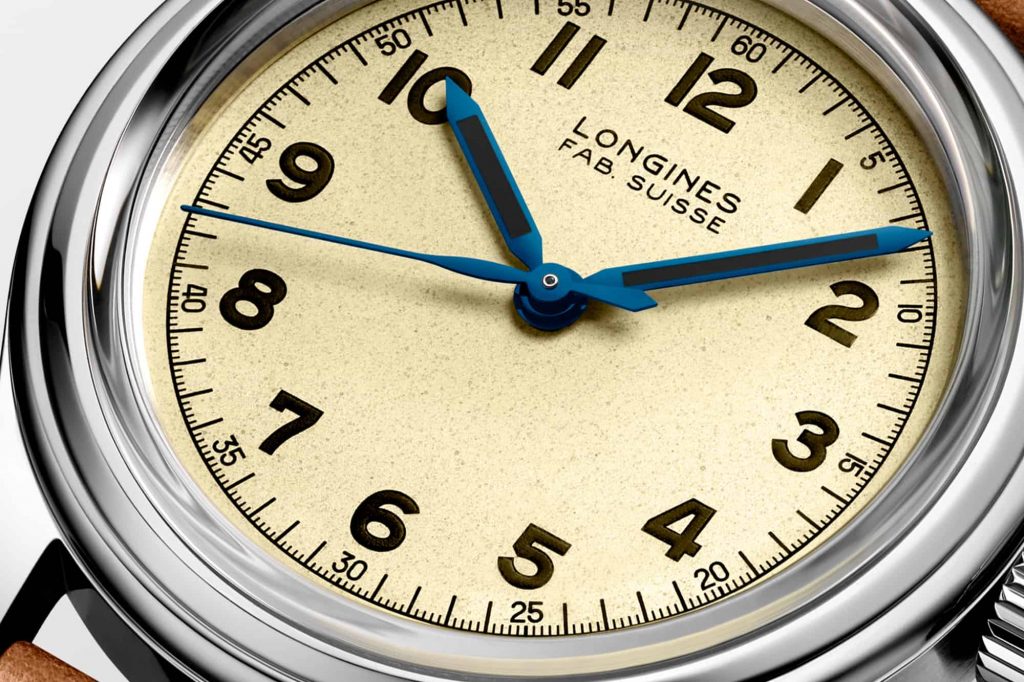 The silvery dial copy watch has Arabic numerals.